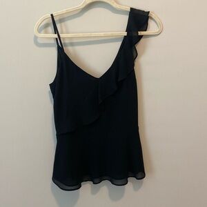 Black asymmetrical top with ruffles